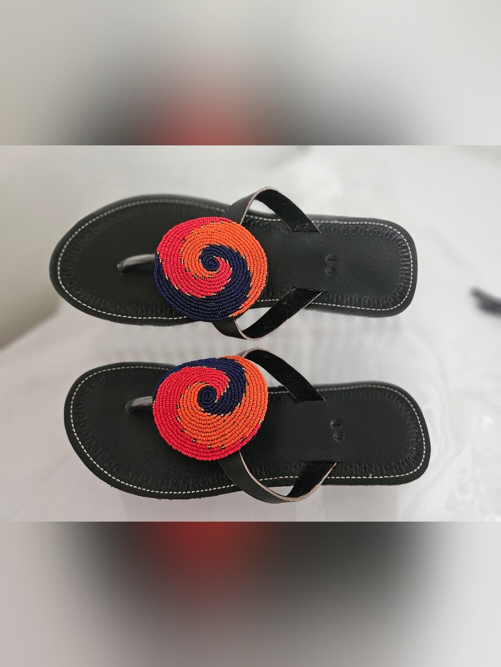 Black Beaded Thong Sandals with Red & Orange Spiral Accent